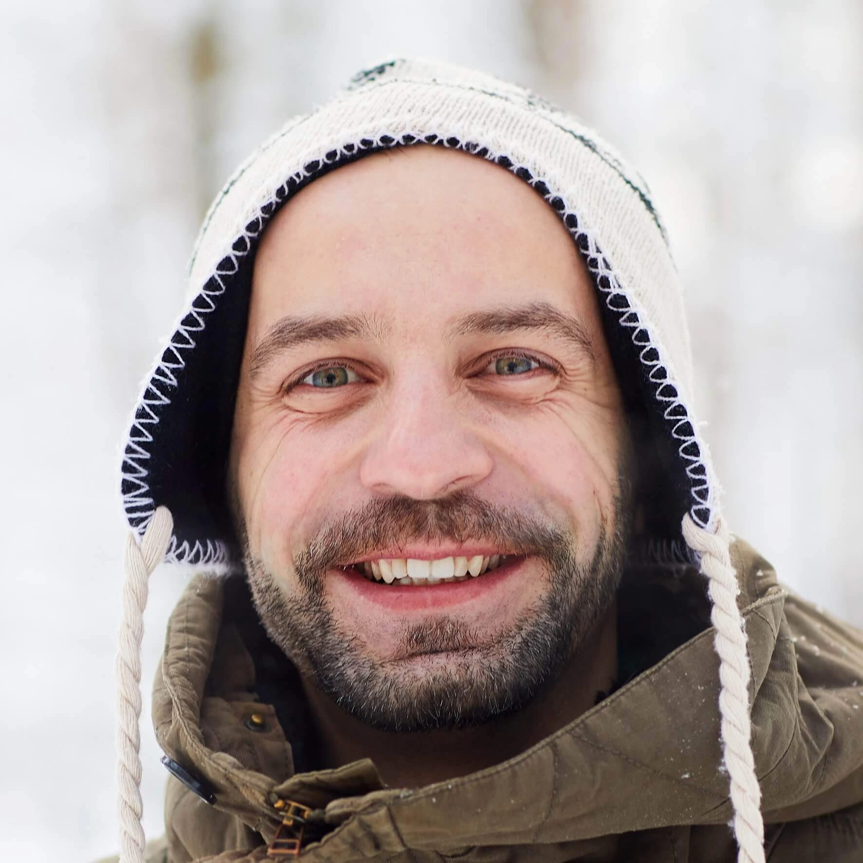 smiling-adult-man-in-winter